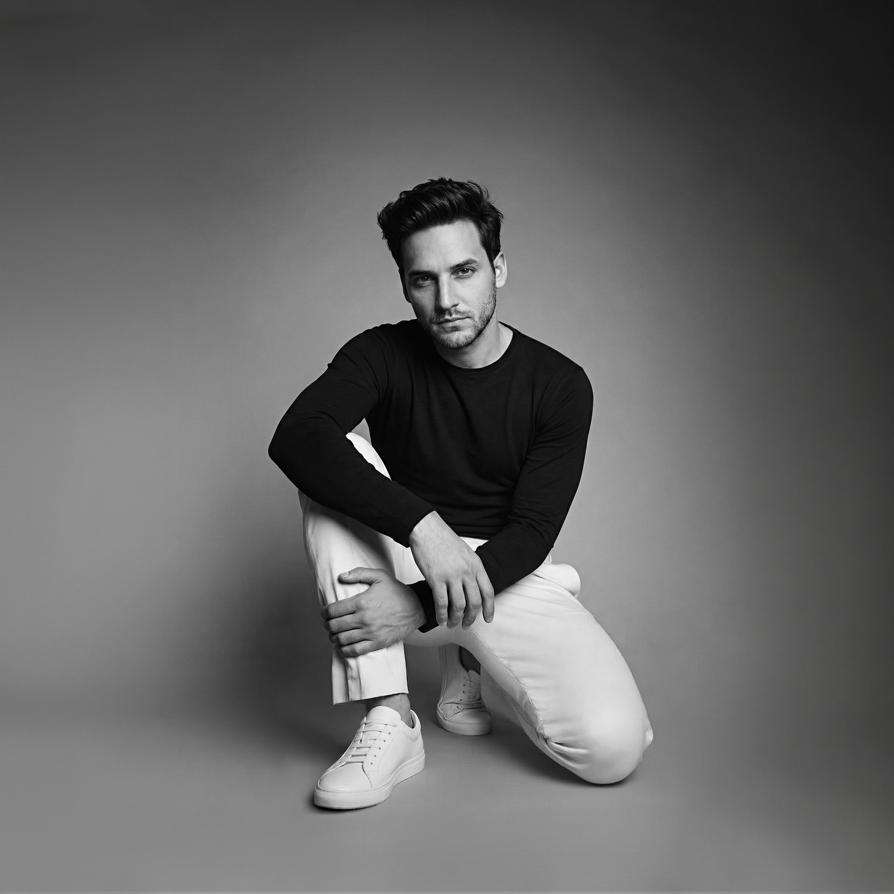 Danny Wave black and white editorial square 1 of 3, American streamer and music producer, high contrast portrait.